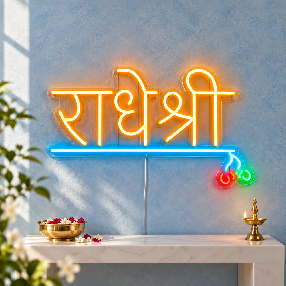 Radhe Shri LED neon sign in orange Hindi lettering with blue flute line